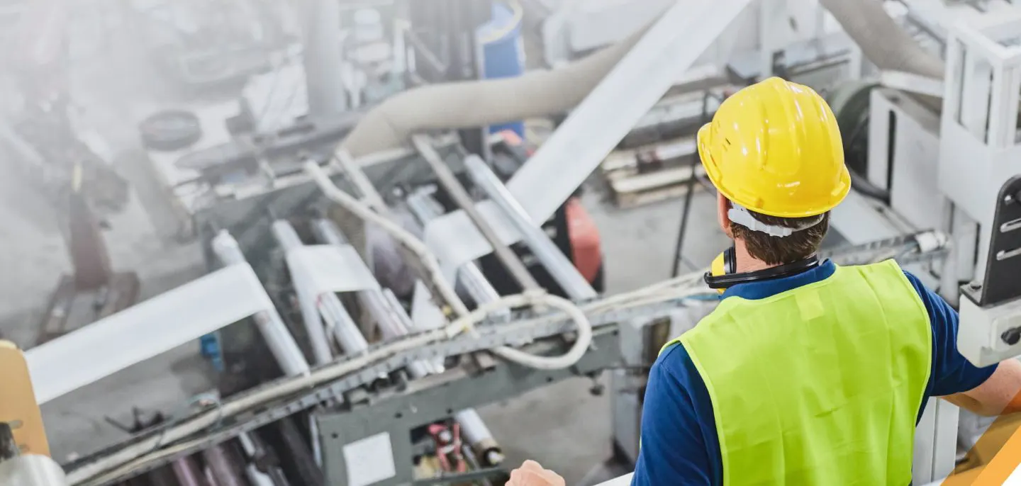 Technician supervising a production line